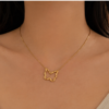 Minimal Butterfly neckpiece.