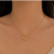Minimal Butterfly neckpiece.